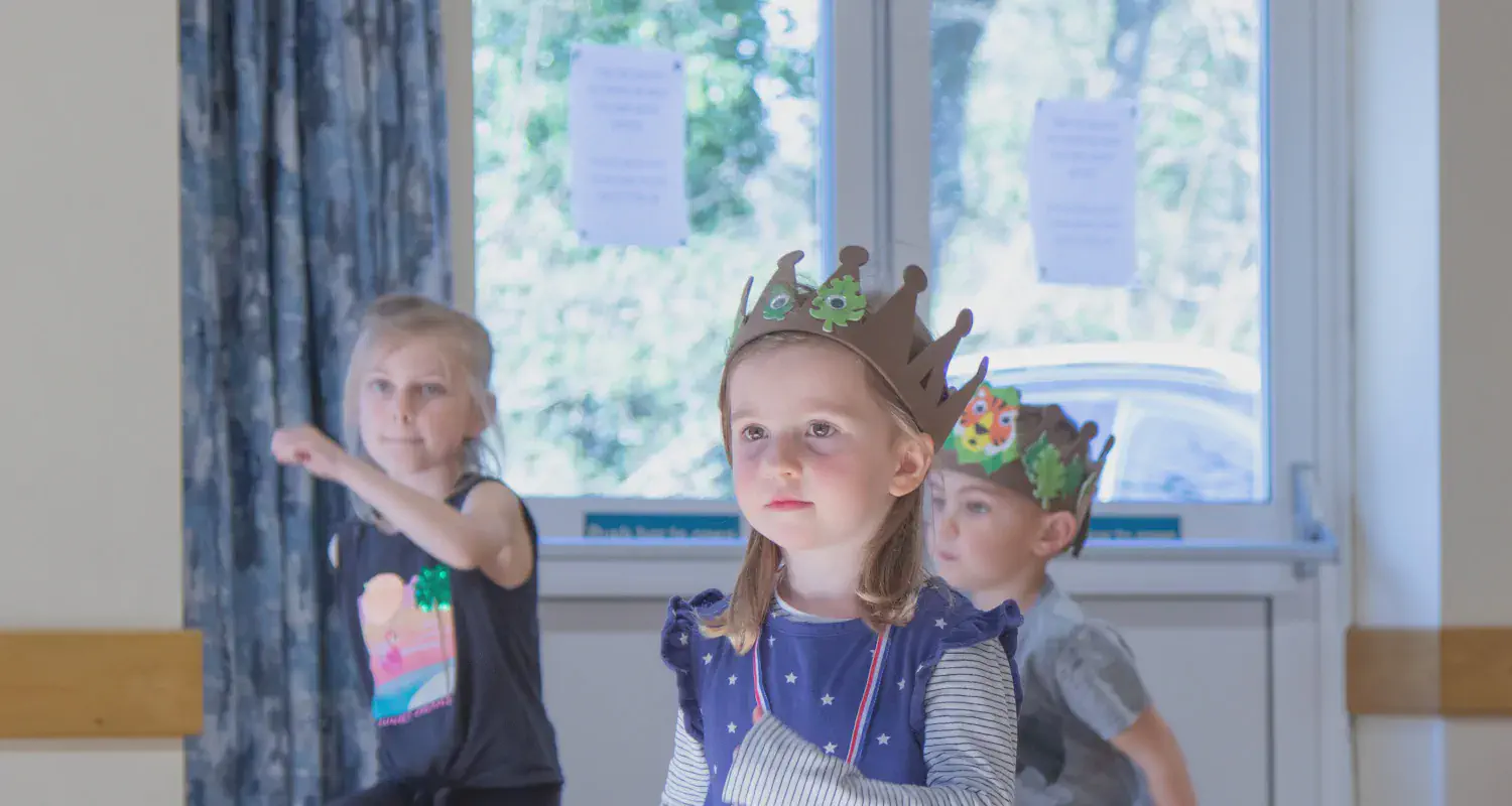 Dance students participating in a Year 2 To Year 4 Musical Theatre Class In Brockham, Surrey